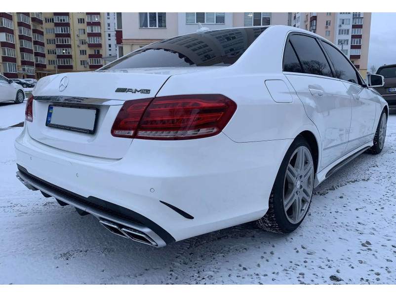 Задній бампер  ( стиль E63 AMG ) на Mercedes-Benz E-Class W212 2013-2016 року