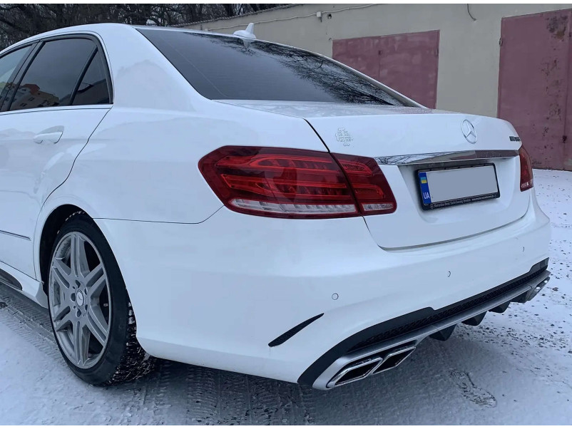Задній бампер  ( стиль E63 AMG ) на Mercedes-Benz E-Class W212 2013-2016 року