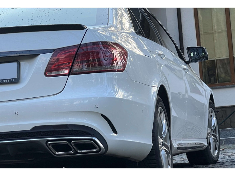 Задній бампер  ( стиль E63 AMG ) на Mercedes-Benz E-Class W212 2013-2016 року